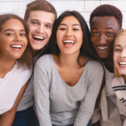 Invisalign Teen patient in Los Alamitos smiling with friends
